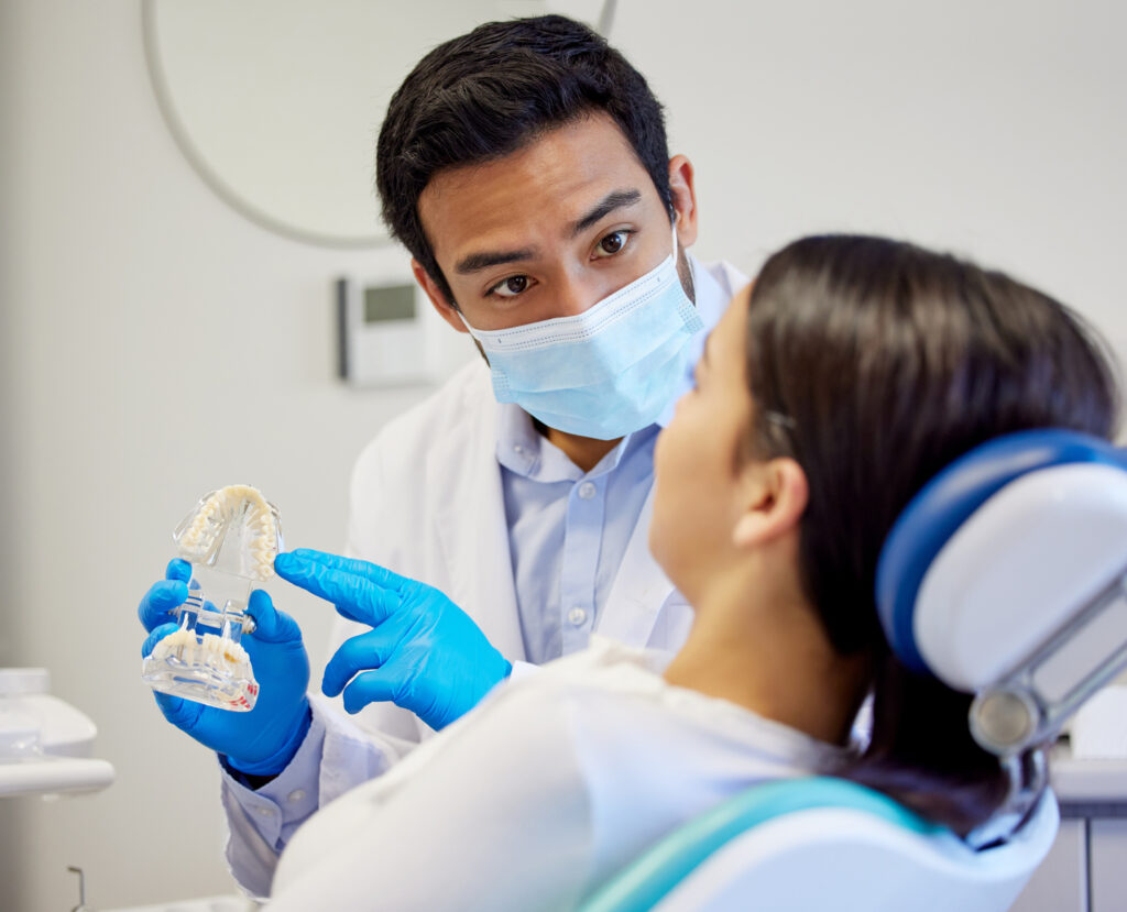 Dentist examining mouth