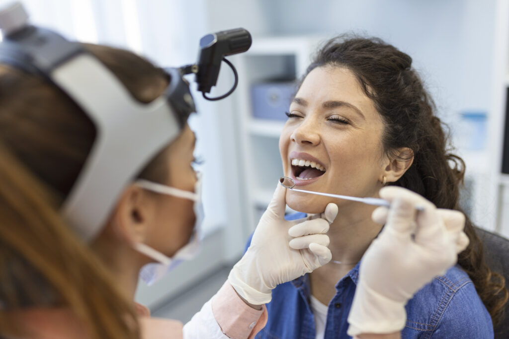 Patient talking to oral surgeon